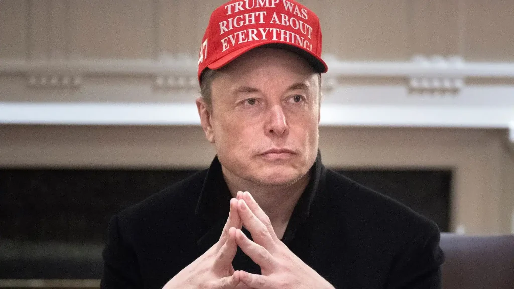 Elon with trump cap